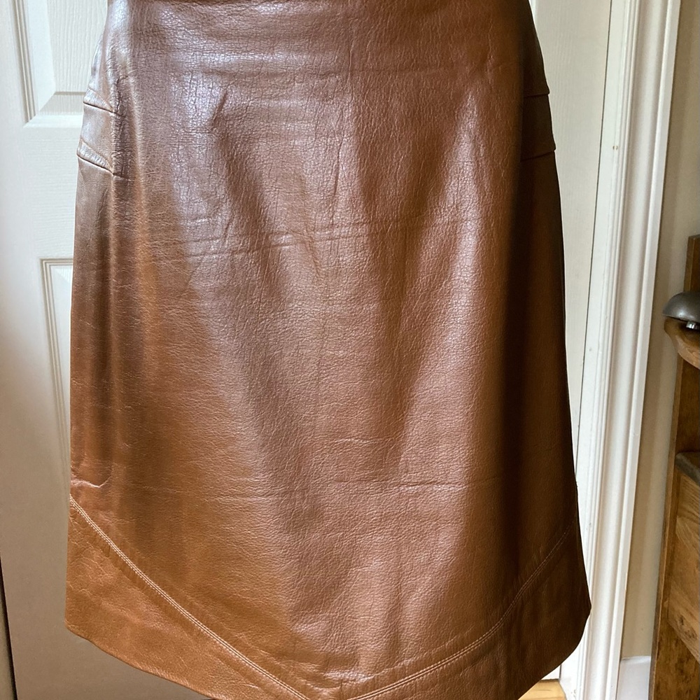 Vintage Leather skirt with dart and topstitching detail.